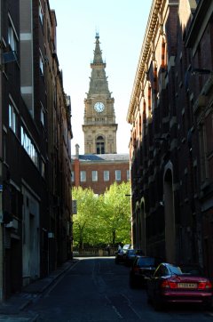 Church Steeple Through Narrow Street